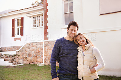 Buy stock photo New home, portrait and couple hug for house, real estate building and property purchase, sale or mortgage investment. Happiness, love and smiling man, woman or people embrace for homeowner relocation