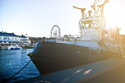 Buy stock photo A boat moored in a shipyard