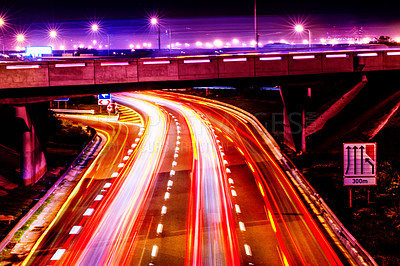 Buy stock photo Night lights, city and highway with driving infrastructure in cape town with road travel development. Transportation, neon lighting and urban street in the evening and dark in Africa rush and blur