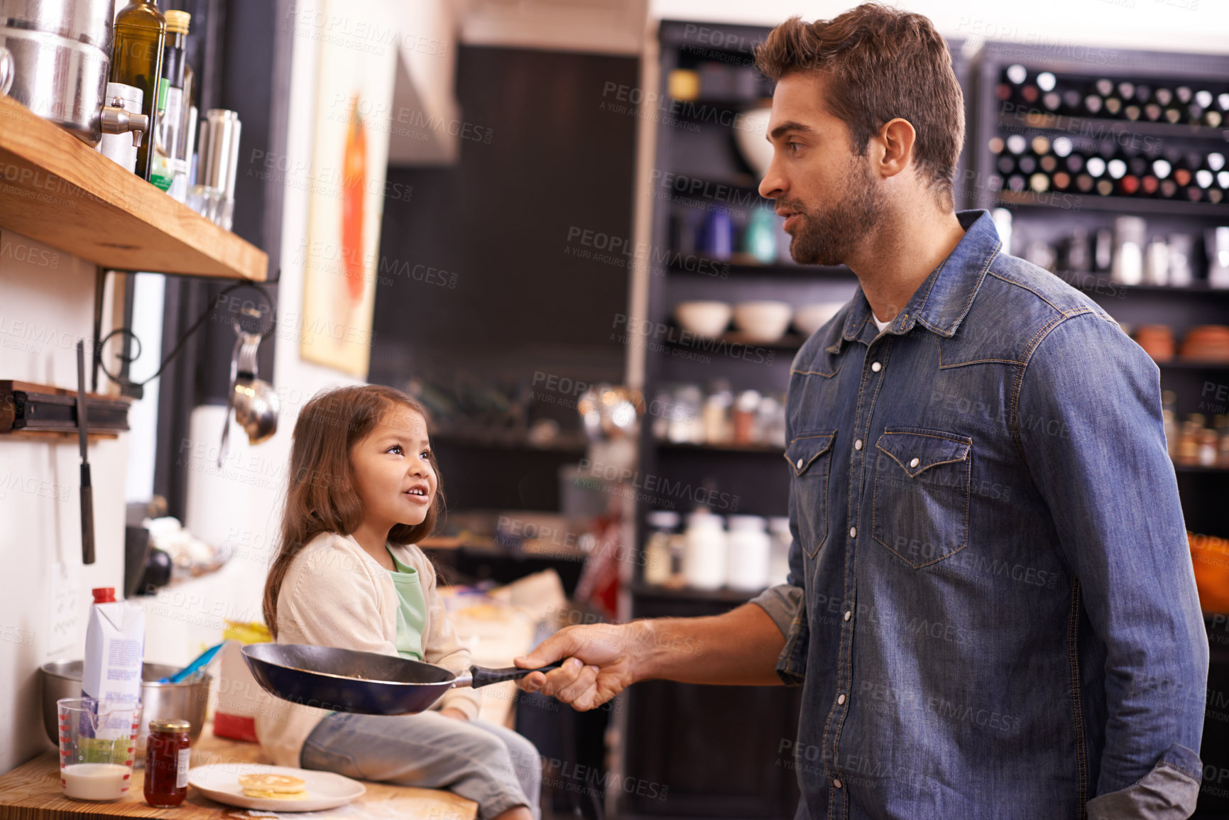 Buy stock photo Cooking, food and father with daughter in kitchen for breakfast, morning and learning. Helping, happy and nutrition with man and young girl in family home for weekend, bonding and teaching