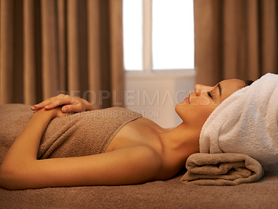 Buy stock photo Body, relax and woman at massage table in spa for skincare, wellness or sleeping at bed with eyes closed at luxury resort. Cosmetics, resting and person at salon for peace, calm or beauty therapy