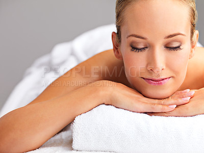 Buy stock photo Woman, massage and spa for zen and treatment, destress and wellness for acupressure at luxury resort. Serene, peace and calm with eyes closed for stress relief, self care service and holistic healing