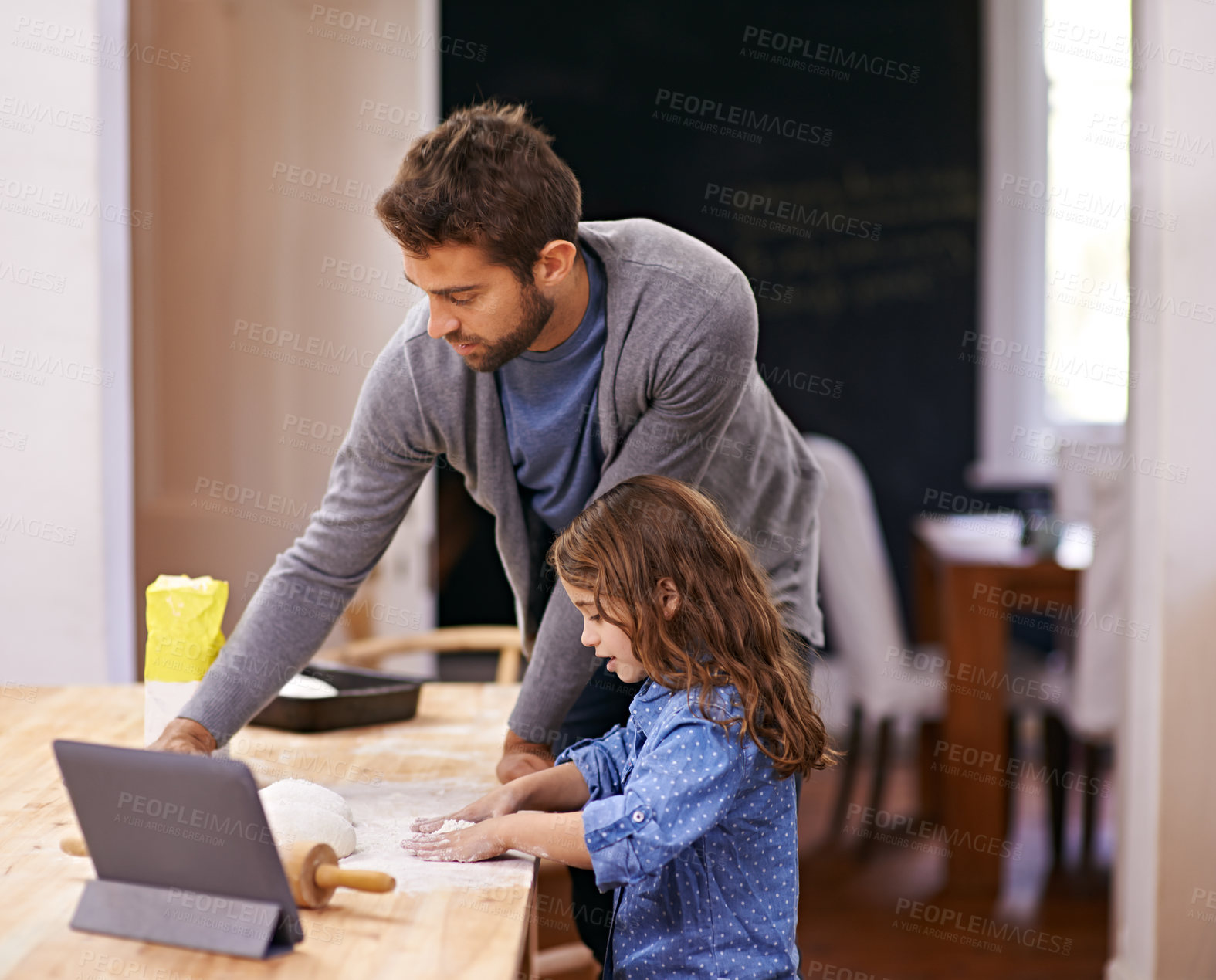 Buy stock photo Cooking, pizza and family in kitchen and tablet for recipe, guide and learning from online tutorial with child. Teaching, baking and girl helping dad with rolling pin in home and together for dinner