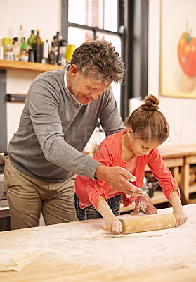 Buy stock photo Cooking, rolling pin or grandfather with child in kitchen teaching a recipe for support or learning in home. Family, baking or girl with bowl, grandpa or senior man for dinner, supper or lunch meal