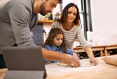 Buy stock photo Learning, cooking and family in kitchen with tablet for recipe, guide and mom and dad with child in home. Baking, pizza and parents helping girl with rolling pin and talking about dinner meal prep