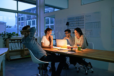 Buy stock photo Collaboration, night and a business team working in the boardroom for planning, strategy or innovation. Meeting, teamwork and overtime with a group of employees at work on a laptop in the evening