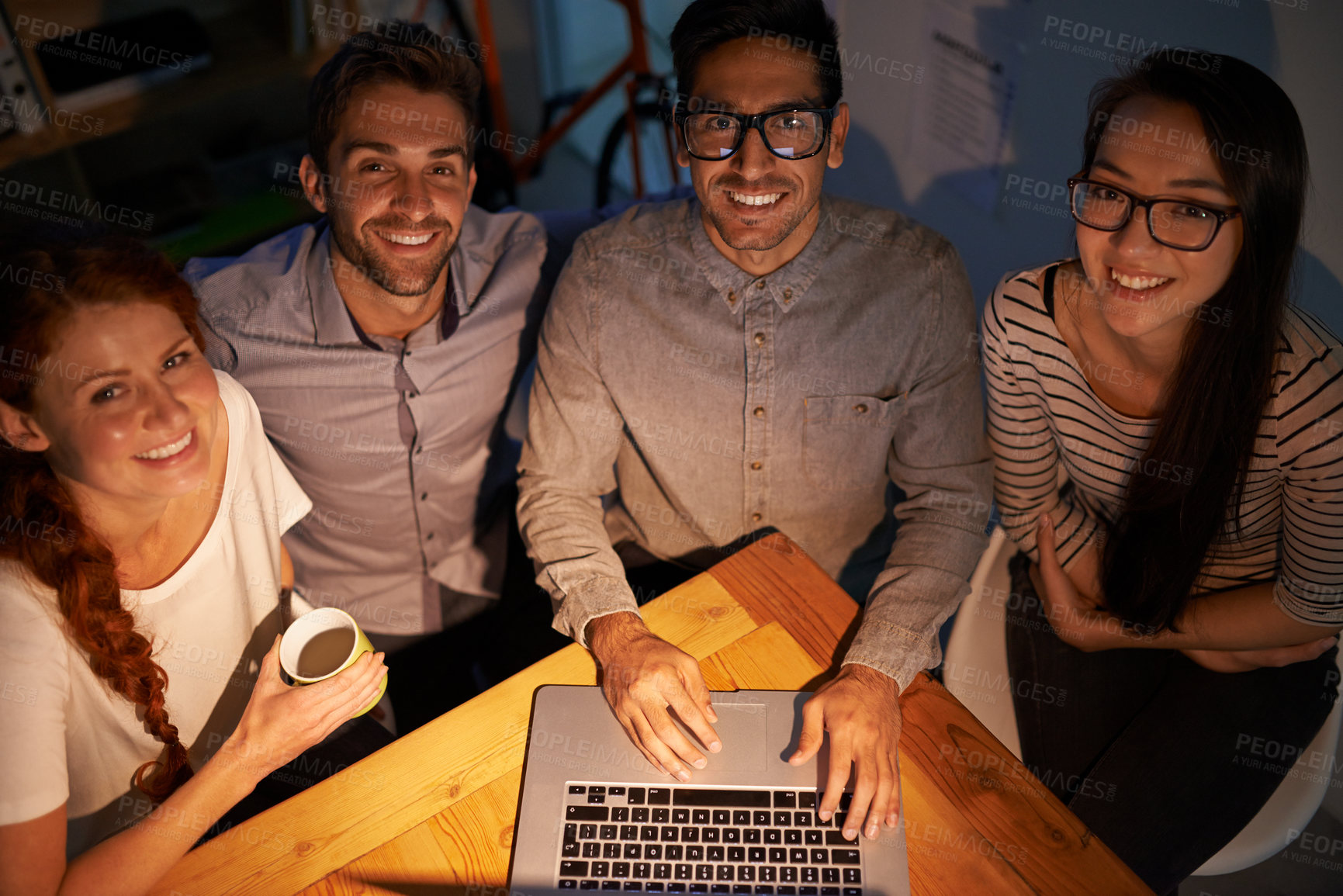 Buy stock photo Portrait, laptop and business friends at night, working in the boardroom for design or modern creativity from above. Meeting, teamwork and overtime with designer colleagues at work in the evening