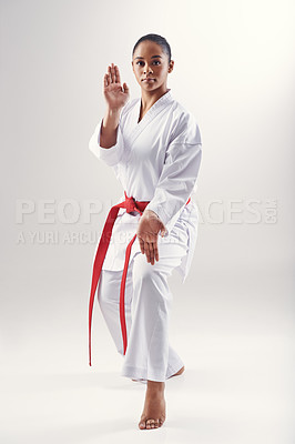 Buy stock photo An ethnic woman doing karate