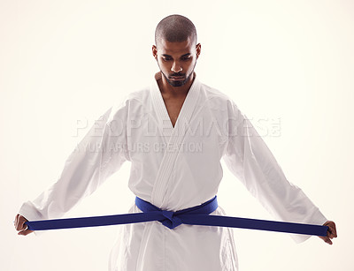 Buy stock photo An african mandoing karate