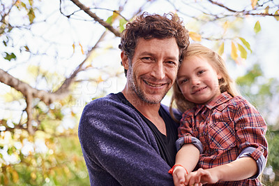 Buy stock photo Happy, love and portrait of father and daughter in backyard garden for hugging, bonding or affectionate. Happiness, relax and family with man and young girl in outdoors for embrace, autumn and care