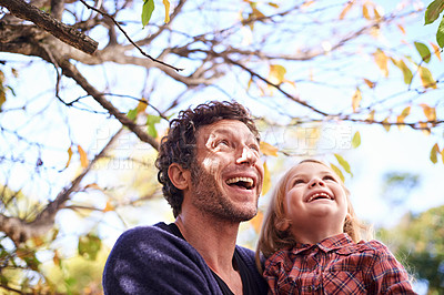 Buy stock photo Father, daughter and excited in garden in autumn with trees, leaves and healthy childhood development. Family, man and girl child with happiness in backyard of home for bonding, recreation and relax