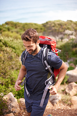 Buy stock photo Man, hike and mountain for recreation with rocks and trees for nature and outdoor in environment. Young person, smile and bag for fitness and active for walk and adventure for exercise and sport