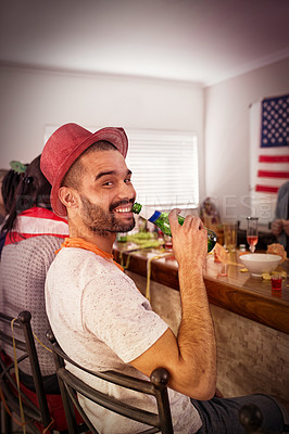 Buy stock photo Portrait, man and beer at house party, room and college dormitory in USA for new year celebration, fun and freedom. Happy guy, drinking alcohol bottle and celebrate with social friends in apartment 