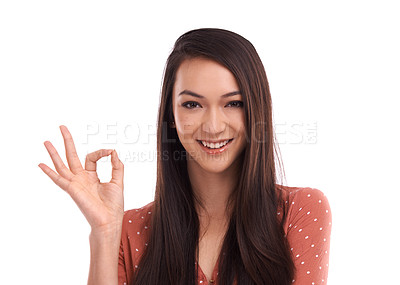 Buy stock photo Hands, ok and portrait of Asian woman on a white background for vote, agreement and success. Mockup, advertising and face of girl isolated in studio with hand gesture for good news, support and yes