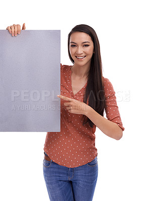 Buy stock photo Mockup, portrait and woman pointing at poster, placard or billboard for promotion, advertising or product placement. Marketing sign, banner space or sales girl with studio mock up on white background