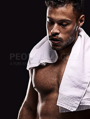 Buy stock photo Fitness, towel and tired man in studio for intense training, challenge or body workout on black background. Breathing, face and male bodybuilder with sports, fatigue or workout pause for recovery