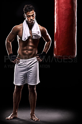 Buy stock photo Sport, boxer and man with towel in studio with gloves for training with strength and muscle. Adult, athlete and male person in dark background, healthy and power with body, punching bag and tired