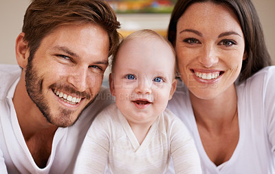 Buy stock photo Portrait, happy father and mother of baby for love, care and quality time together to relax at home. Face, smile and parents with newborn child for development, caring support and happiness of family