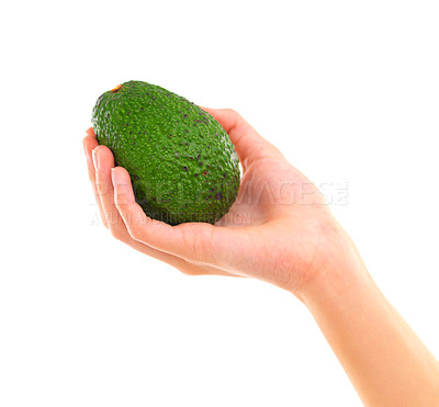 Buy stock photo Nutrition, fruit and hand in studio for healthy diet, wellness and vitamin c on white background. Avocado, green and holding for delicious ingredients, organic food and vegetarian meal with mockup