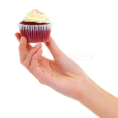 Buy stock photo Closeup studio shot of a woman holding up a cupcake isolated on white