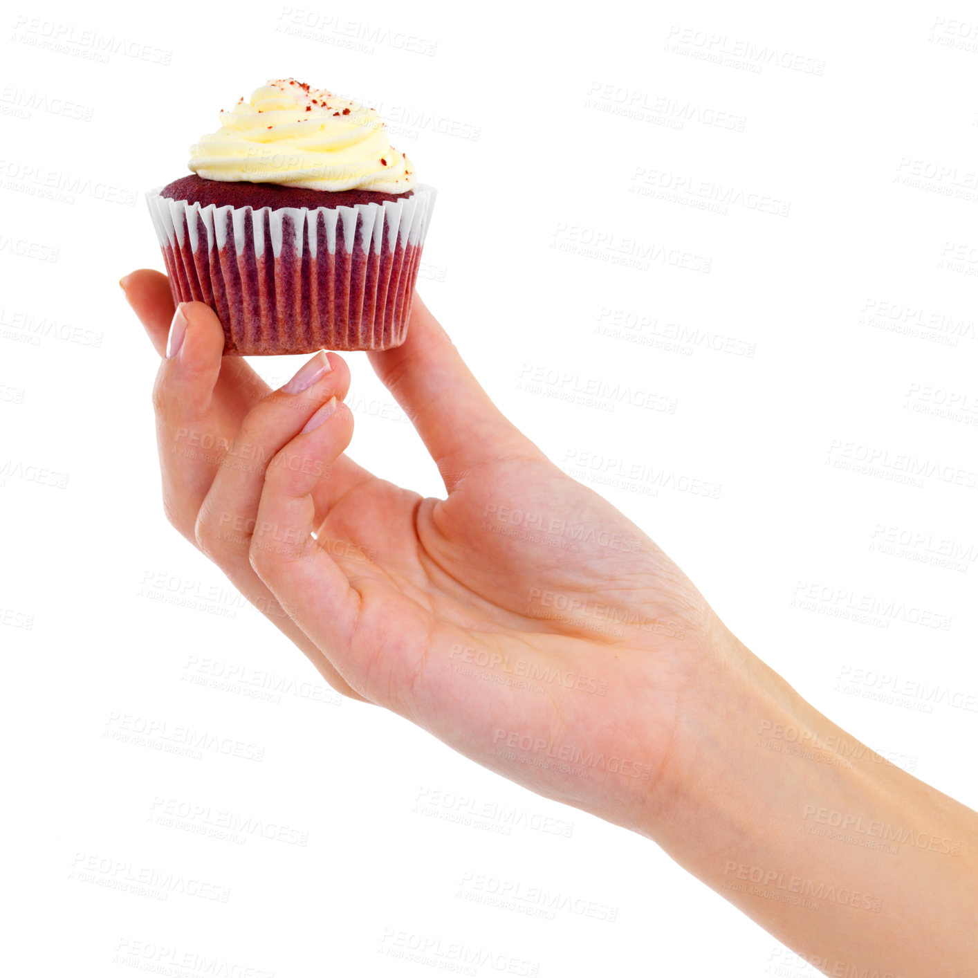 Buy stock photo Closeup studio shot of a woman holding up a cupcake isolated on white
