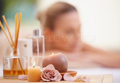 Buy stock photo ropped shot of a mature woman relaxing on a massage table at a day spa