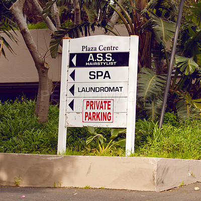 Buy stock photo Private parking, building and sign with mall information, notification and message on property. Signage, symbol and store names on poster, board or attention for warning, direction or advertising