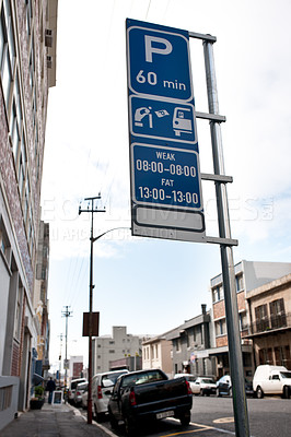 Buy stock photo Road sign, warning and signage in street for parking with caution notification and blue square outdoor in city. Attention, public notice and signpost for car park to pay, alert message and symbol