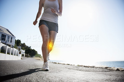 Buy stock photo Woman, running and knee x ray for injury, workout or sport accident during exercise or run in the city. Female runner in body fitness with sore leg, ache or bone from exercising or training on road