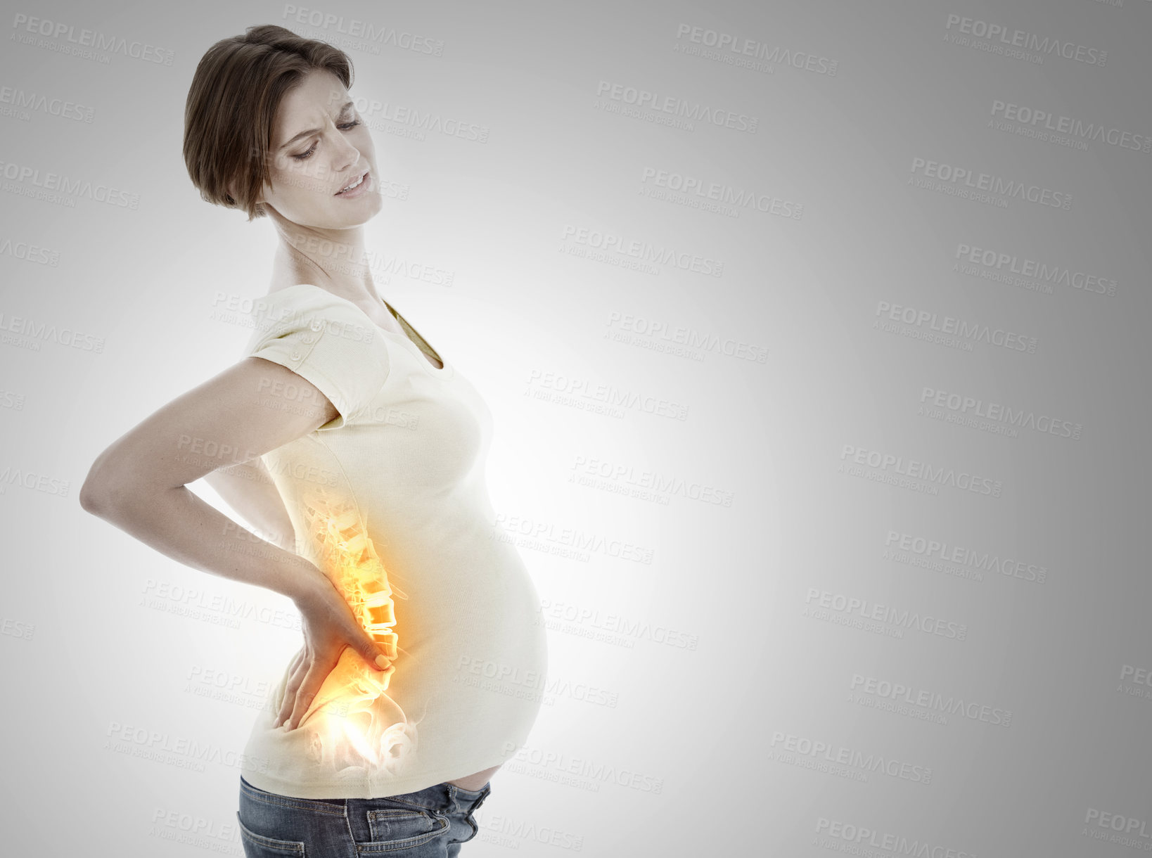 У беременной болит спина