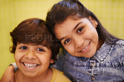 Buy stock photo Portrait of two siblings standing together indoors