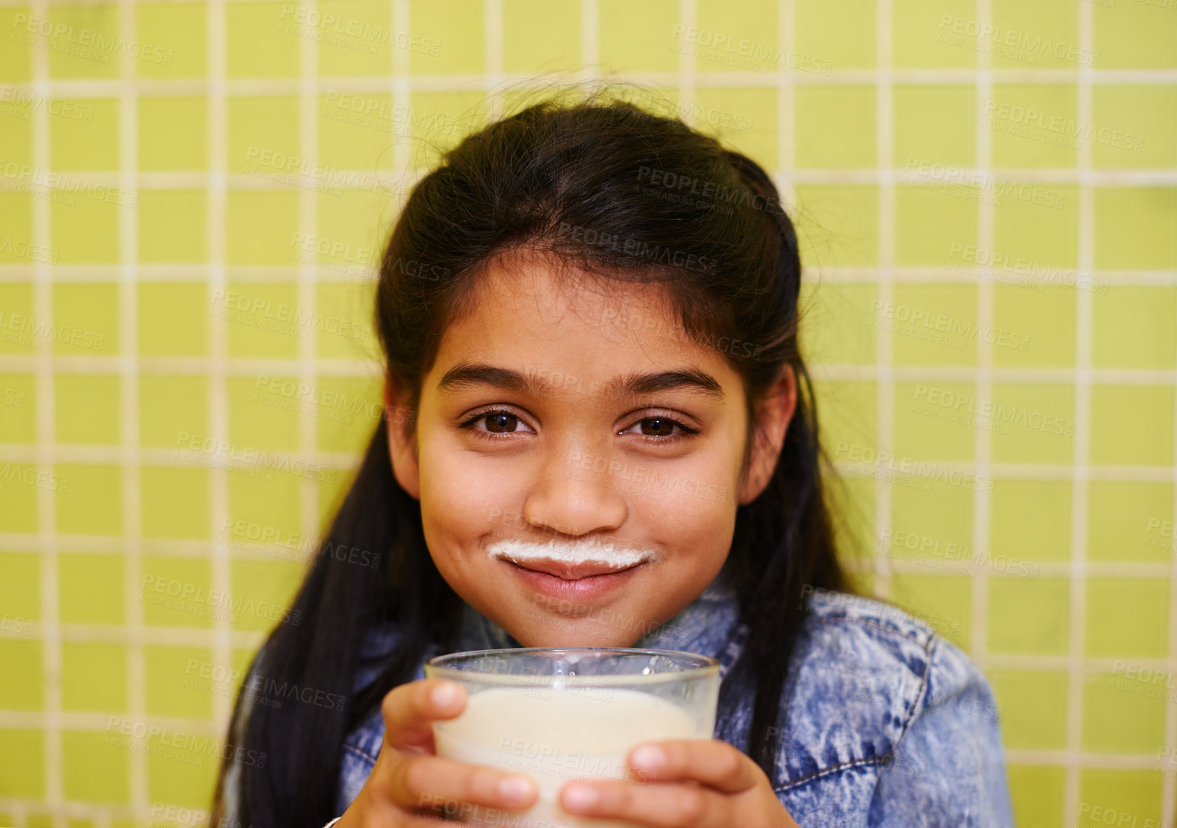 Buy stock photo Milk moustache, smile or girl portrait in house with healthy breakfast drink on yellow wall background. Protein, dairy and face of kid in india with milkshake for balance, energy or calcium nutrition