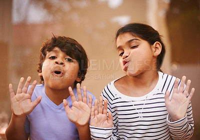 Buy stock photo Window, face and funny siblings with kids press comic in a house with silly, joke or goofy gesture. Glass, mouth or Indian child with humor, games or playing on vacation, holiday or weekend in India