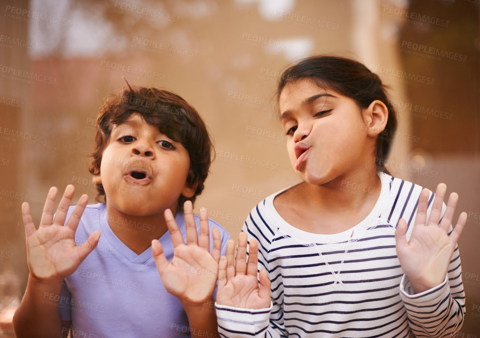 Buy stock photo Window, face and funny siblings with kids press comic in a house with silly, joke or goofy gesture. Glass, mouth or Indian child with humor, games or playing on vacation, holiday or weekend in India