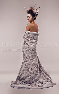 Buy stock photo A beautiful young model wrapped in a blanket while isolated