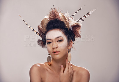 Buy stock photo A portrait of a young woman in a native american-inspired headdress