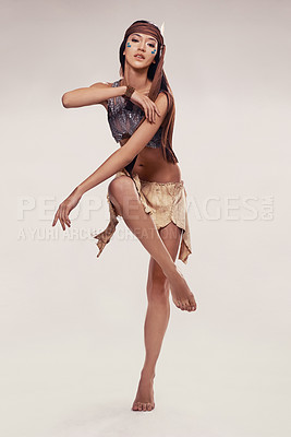Buy stock photo Portrait, woman and Native American dance in studio with warrior makeup, confidence and tribe style. Indigenous fashion, performance and girl in First Nations clothes on white background with culture
