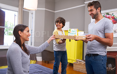 Buy stock photo Mom, child and dad with gift for mothers day, surprise and appreciation for love, family and kindness. Indian people, parents and boy with smile and joy for giving, celebrating and present in house