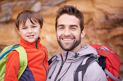 Buy stock photo Father, child and portrait with hiking, backpack and travel with smile and support in nature. Kid, adventure and mountain with love, trust and bonding together with family and journey for holiday