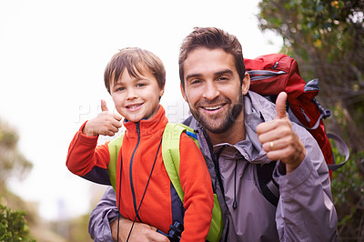 Buy stock photo Father, child and portrait with thumbs up, backpack and travel with smile and hiking in nature. Kid, yes and mountain with love, success and bonding together with family and journey for holiday