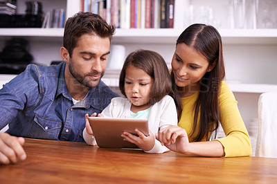 Buy stock photo Mother, father and child in home with tablet for teaching, learning or support in kids education with love. Elearning, digital app and parents with girl for help in homeschool, growth and development