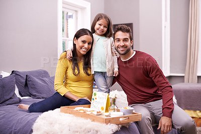 Buy stock photo Portrait, breakfast in bed and family with smile, celebration and bonding together with happiness. Parents, home and mother with father and daughter with food and holiday with vacation and cheerful