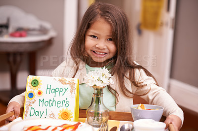 Buy stock photo A little girl bringing her mom breakfast in bed on Mother's Day