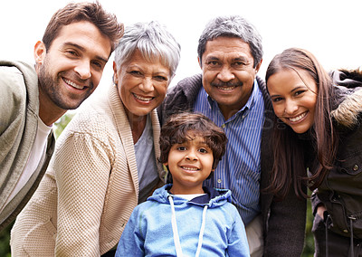 Buy stock photo Shot of a multi-generational family posing for a self-portrait