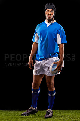 Buy stock photo Ball, man and portrait for rugby, sport and active for game, fitness and sportswear on grass or field. Young person, athlete or player and confident with kit for fit, competitive and recreation   