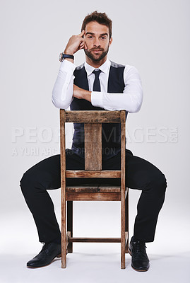 Buy stock photo Chair, thinking and portrait of man with suit for fashion, style or formal wear isolated on white background. Male person, gentleman or businessman with trendy clothes, classy or outfit in studio