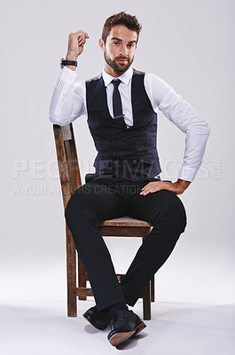 Buy stock photo Chair, confidence and portrait of man with suit for fashion, style or formal wear isolated on white background. Male person, gentleman or businessman with trendy clothes, class or outfit in studio