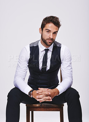 Buy stock photo Man, fashion and portrait in studio with tuxedo or suit and isolated for trendy, style and classy. Young person, serious and handsome for formal clothes with shirt and tie for designer wear and alone