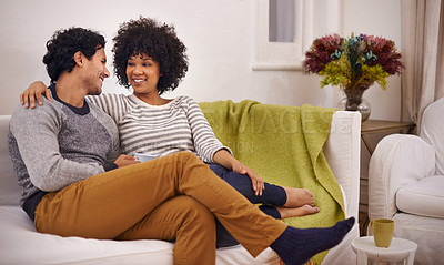 Buy stock photo Couple, couch and hug for care and love in home, smile and proud of marriage and commitment. Happy people, affection and embrace on sofa in living room on weekend, support and trust in relationship