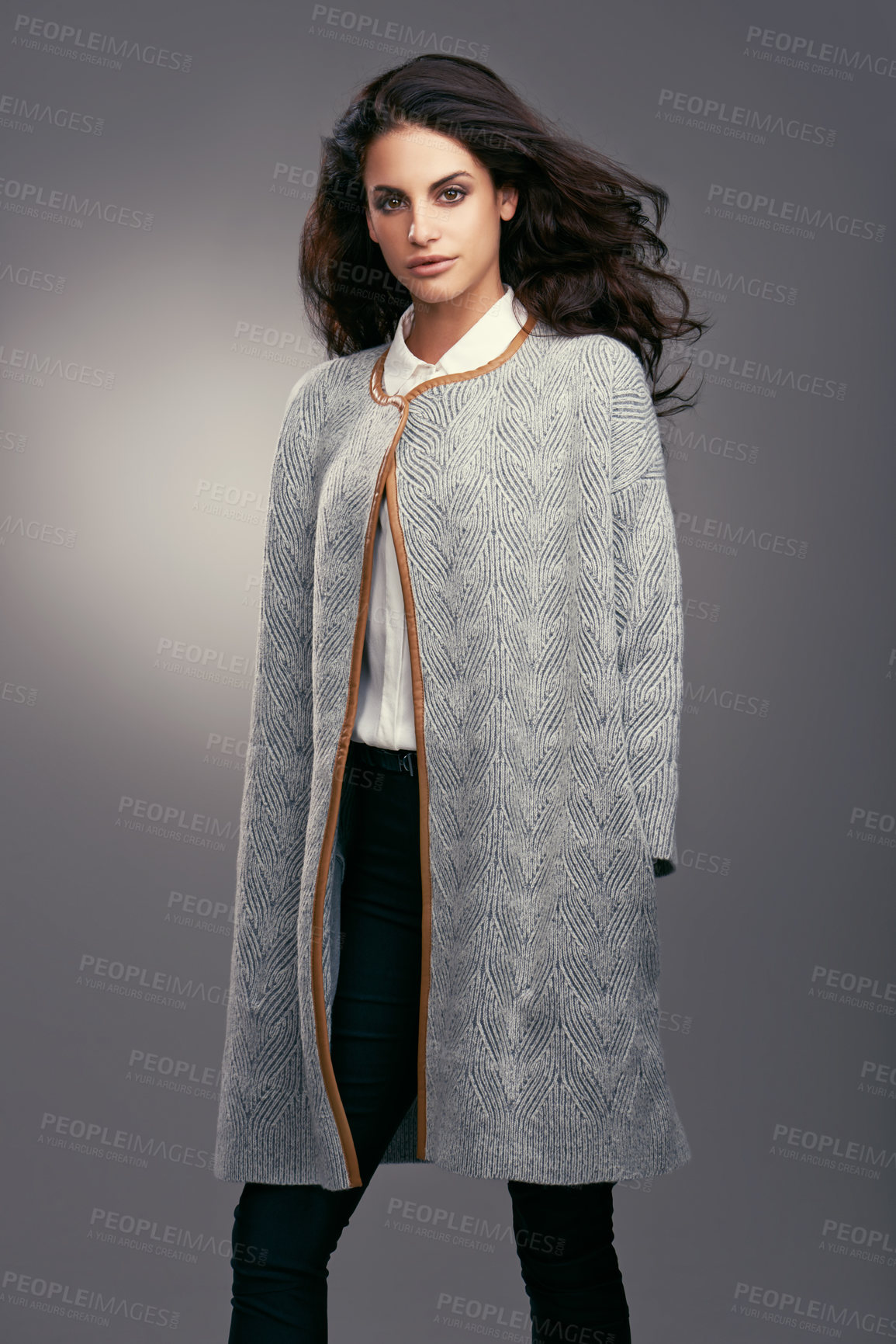 Buy stock photo Woman, portrait and stylish fashion in studio with confidence, classy style and trendy aesthetic with coat. Model, person and face with attitude in elegant clothes and hairstyle on grey background